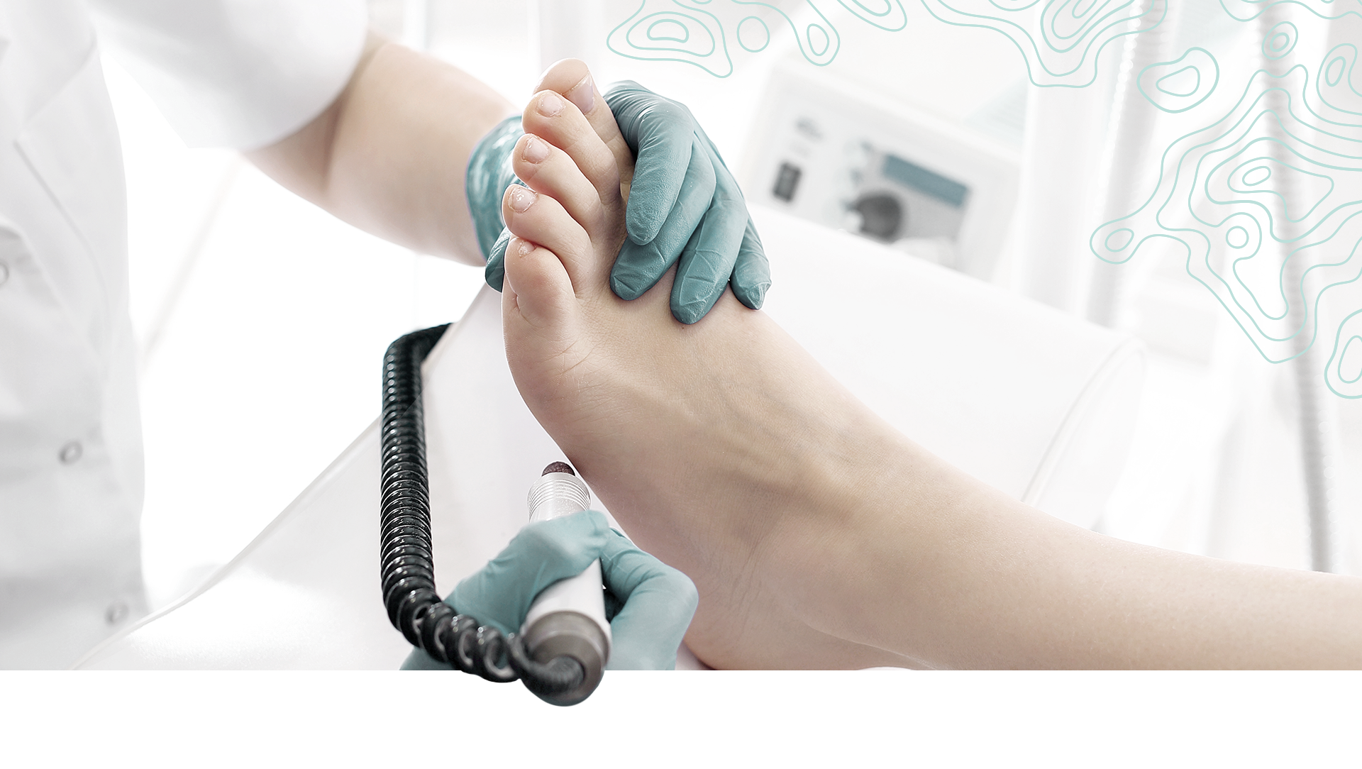 doctor caring for patient foot with tool